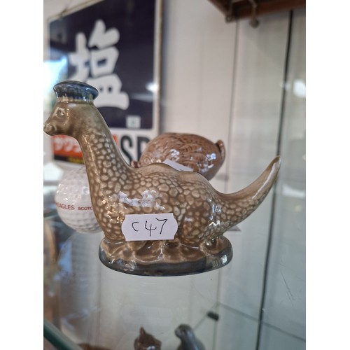 57 - 4 x Ben Eagles scotch whisky figurines 'Haggis 1972' & 'Nessie1969' full decanters plus 1969 eagle a... 