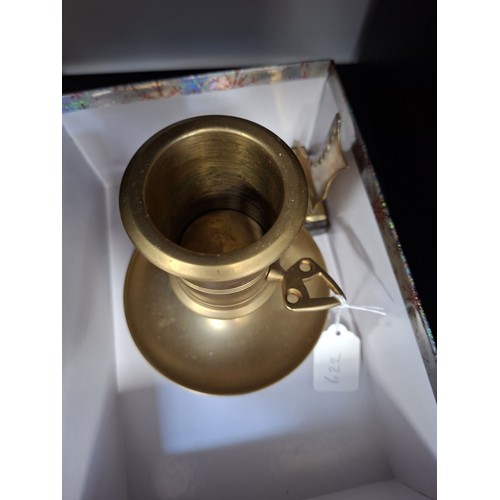 190 - Brass large candle holder, brass boots and copper spirit ladles