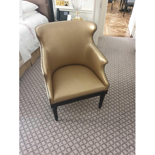 547 - A Modern Wing Back Chair Upholstered In Gold Leather With Pin Stud Detail On Dark Solid Wood Frame L... 