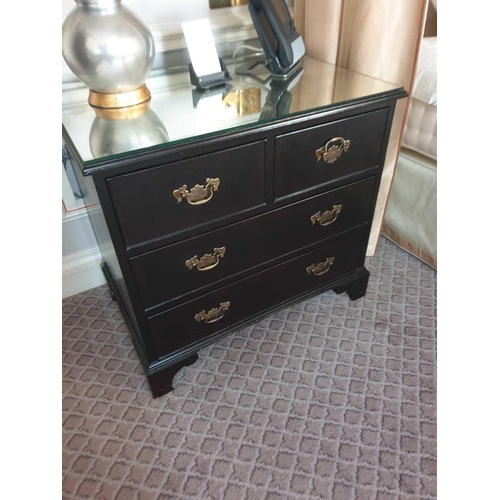 593 - A Pair Four Drawer Mirrored Top Commode Chests Raised By Four Block Feet With A Square Carved Motif ... 