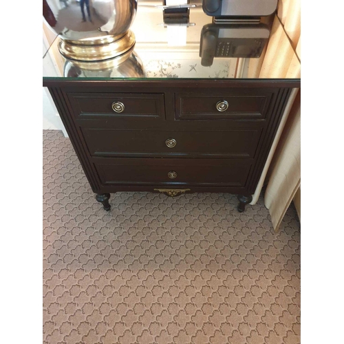 816 - A Pair Four Drawer Mirrored Top Commode Chests Raised By Four Block Feet With A Square Carved Motif ... 