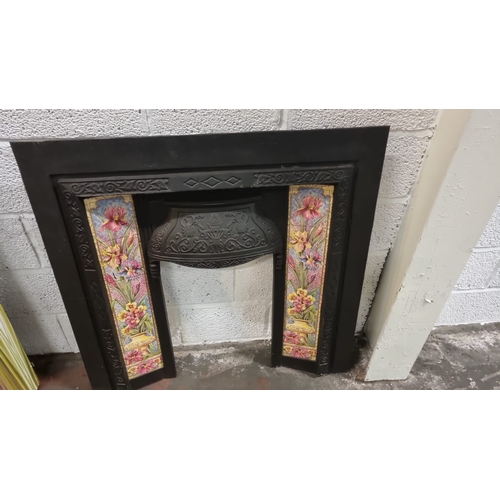 206 - Cast iron fire surround with decorative Victorian style side panels 102 x 100cm  ( This item is loca... 