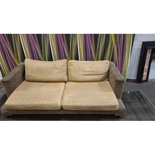 207 - A pair of large lobby sofas upholstered with loose cushions and polished metal legs 200 x 100 x 62cm... 