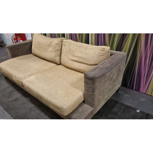 207 - A pair of large lobby sofas upholstered with loose cushions and polished metal legs 200 x 100 x 62cm... 