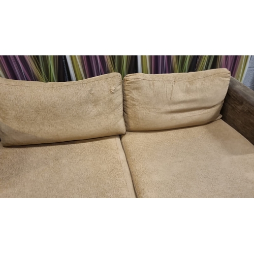 207 - A pair of large lobby sofas upholstered with loose cushions and polished metal legs 200 x 100 x 62cm... 