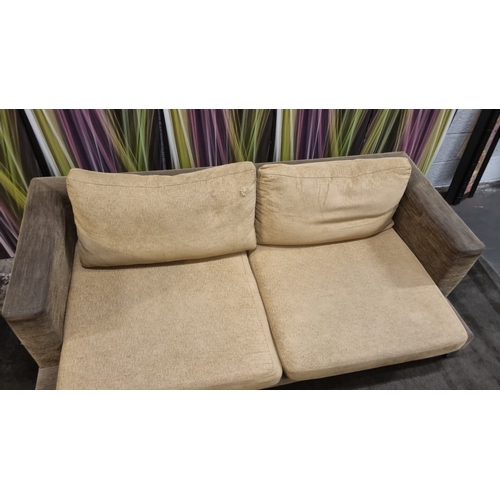 207 - A pair of large lobby sofas upholstered with loose cushions and polished metal legs 200 x 100 x 62cm... 