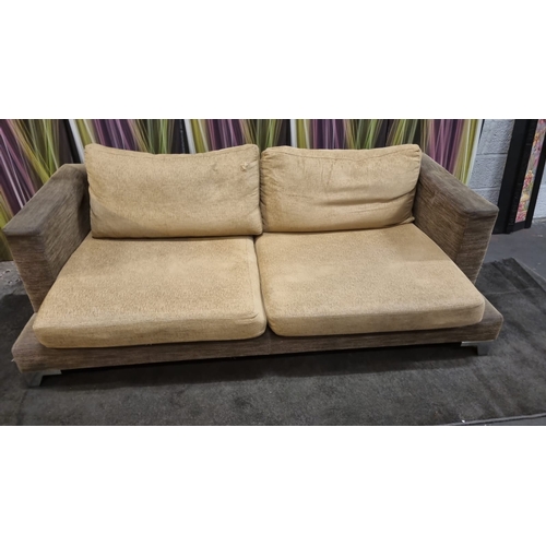 207 - A pair of large lobby sofas upholstered with loose cushions and polished metal legs 200 x 100 x 62cm... 