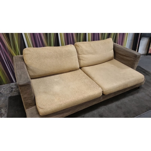 207 - A pair of large lobby sofas upholstered with loose cushions and polished metal legs 200 x 100 x 62cm... 