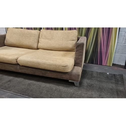 207 - A pair of large lobby sofas upholstered with loose cushions and polished metal legs 200 x 100 x 62cm... 