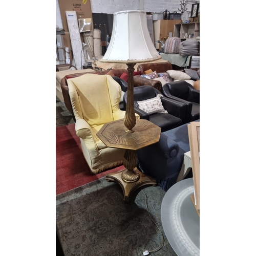 216 - A bronzed mahogany hall lamp table mounted on an hexagonal tabletop  with box strung top above a bal... 