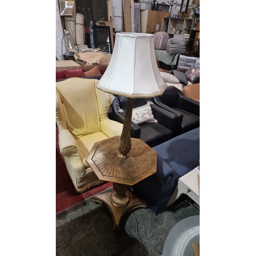 216 - A bronzed mahogany hall lamp table mounted on an hexagonal tabletop  with box strung top above a bal... 