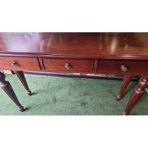 217 - A carved mahogany three drawer hall or console table 140 x 35 x 80cm ( This item is located in Bath)