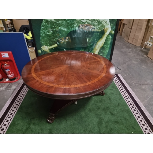 220 - A significant mahogany with banded inner border centre table 185cm diameter . Baluster pillar suppor... 