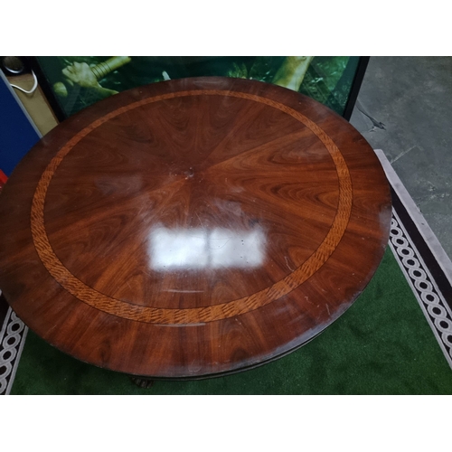 220 - A significant mahogany with banded inner border centre table 185cm diameter . Baluster pillar suppor... 