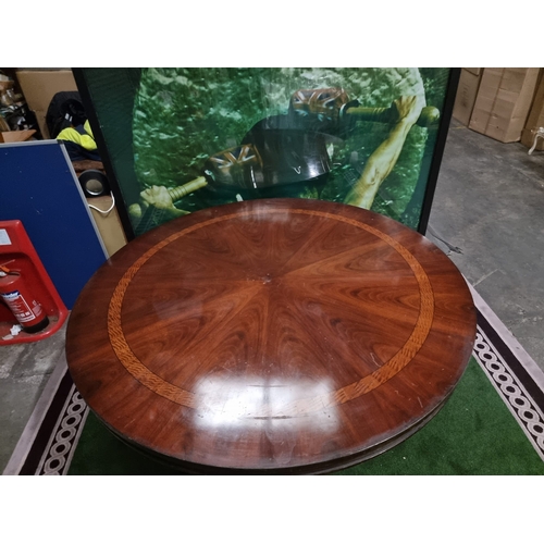 220 - A significant mahogany with banded inner border centre table 185cm diameter . Baluster pillar suppor... 