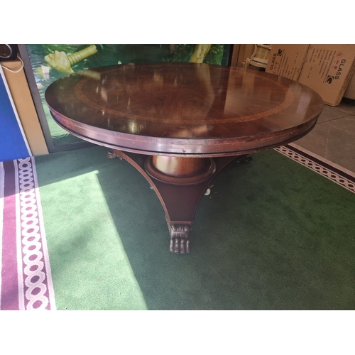 220 - A significant mahogany with banded inner border centre table 185cm diameter . Baluster pillar suppor... 