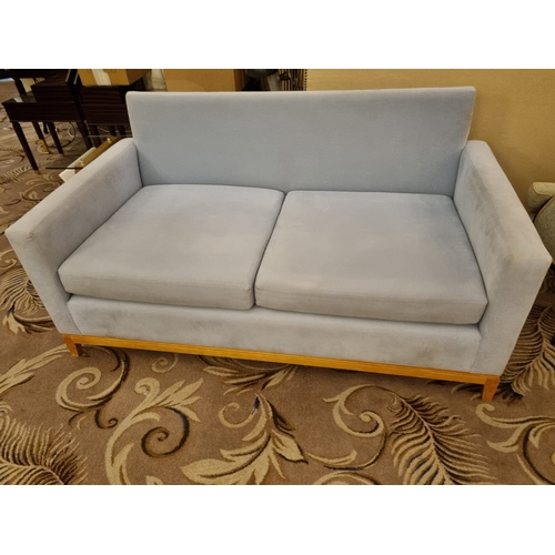 246 - A Blue Upholstered  Plush Fabric Sofa Offering A Decidedly Modern Take On The Classic Chesterfield S... 