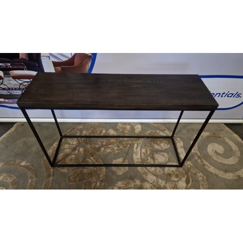 51 - Dark Wooden Hall Table On A Black Metal Frame  With Its Sturdy Yet Refined Appearance This Cons... 