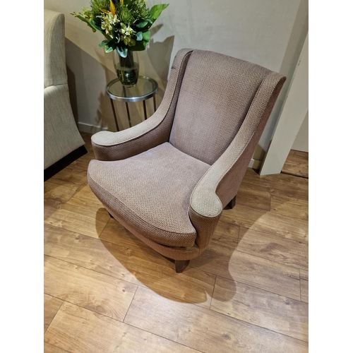 157 - An upholstered shaped armchair with out swept arms 84 x 60 x 86cm  (Room LG -)