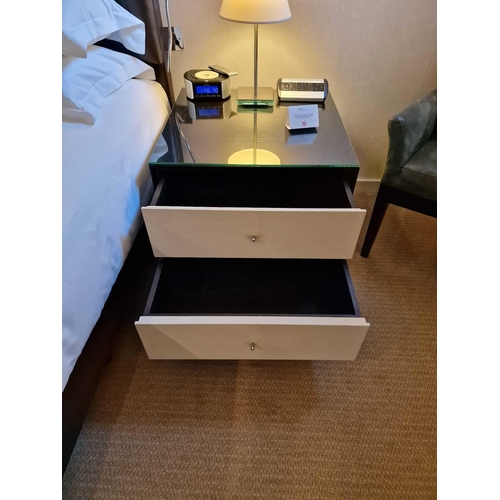 60 - A pair of bedside cabinets by Benhardt black ash mounted glass protective top on stainless steel bas... 