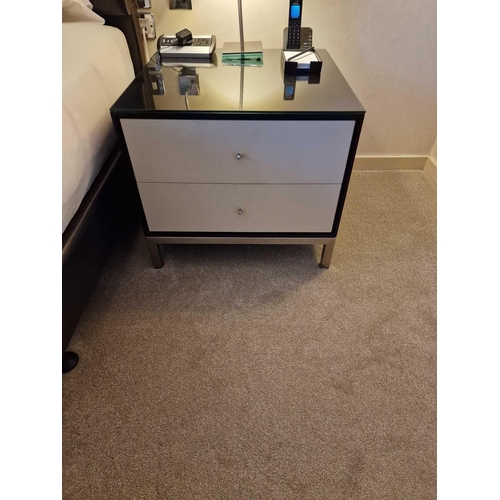 62 - A pair of bedside cabinets by Benhardt black ash mounted glass protective top on stainless steel bas... 