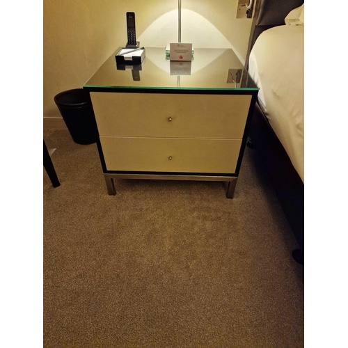 67 - A pair of bedside cabinets by Benhardt black ash mounted glass protective top on stainless steel bas... 