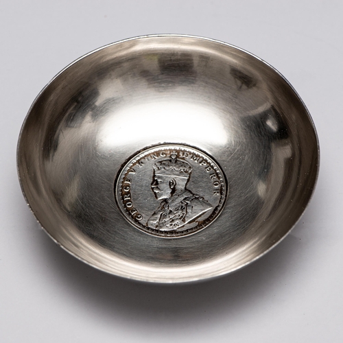 24 - George V One Rupee Silver Bowl 

  Metal: Silver 917 
 

  Weight: 57.83 grams 
 

  Size/Measuremen... 