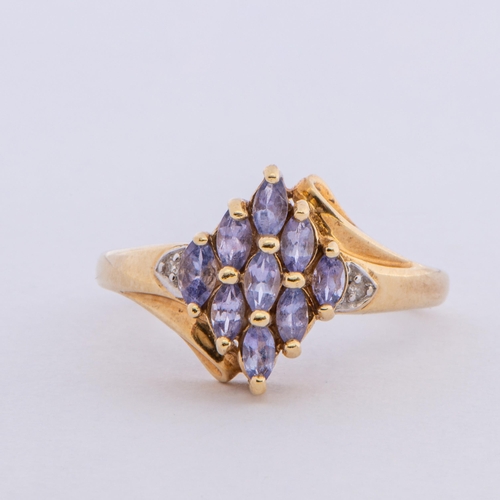 169 - 0.65 Cts Natural Tanzanites and Diamonds Gold Ring, 9K Gold, Size Q to R 

  Metal: Yellow Gold 9K/3... 