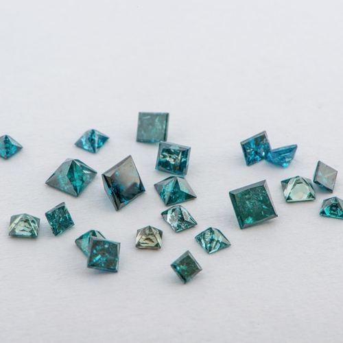 29 - A Collection of 21 Princess Cut Fancy Blue Diamonds, Total weight 2.20 Ct. Most likely irradiated na... 