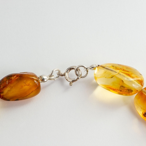 12 - Stately Transparent Natural Baltic Amber Necklace with Silver Clasp. Colours slightly vary from deep... 