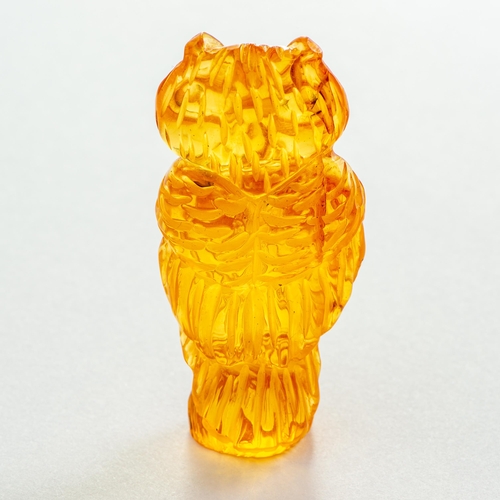 19 - Hand Carved Transparent Natural Baltic Amber Owl Figurine. Pleasant Orange colour, several petty inc... 