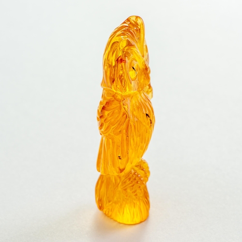 19 - Hand Carved Transparent Natural Baltic Amber Owl Figurine. Pleasant Orange colour, several petty inc... 