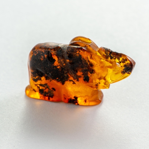 56 - Hand Carved semi-Transparent Natural Baltic Amber Elephant Charm/Figurine. Heavily included Orange c... 