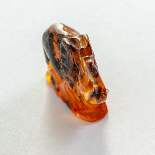 56 - Hand Carved semi-Transparent Natural Baltic Amber Elephant Charm/Figurine. Heavily included Orange c... 