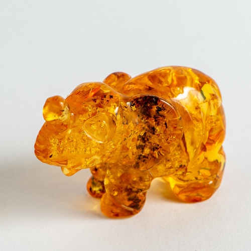 61 - Hand Carved Transparent Natural Baltic Amber Elephant Figurine. Light Orange colour Amber with visib... 