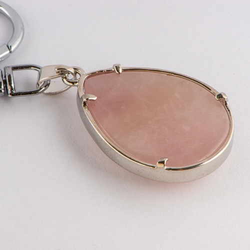 287 - Key Fob with Natural Rose Quartz, TGGC Certificate of Authenticity 

  Weight: 22.70 gram 
 

  Size... 