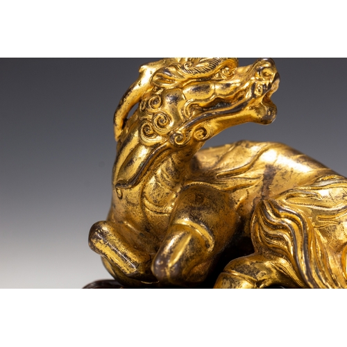 20009 - A Chinese gilt bronze ornament, Qing Daynasty Pr.  Size:(Height9cm, Width6cm, Length9cm, Weight820g)... 