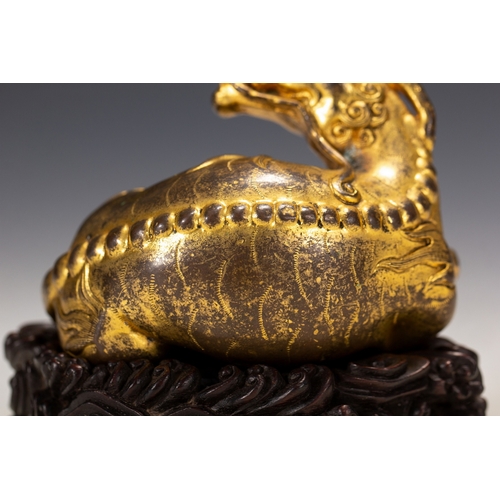 20009 - A Chinese gilt bronze ornament, Qing Daynasty Pr.  Size:(Height9cm, Width6cm, Length9cm, Weight820g)... 