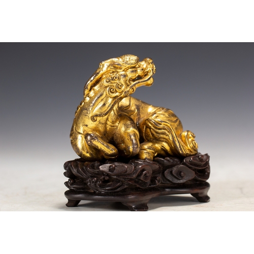 20009 - A Chinese gilt bronze ornament, Qing Daynasty Pr.  Size:(Height9cm, Width6cm, Length9cm, Weight820g)... 