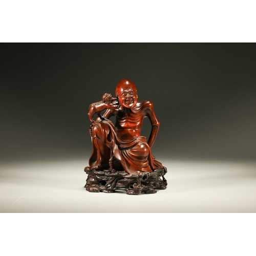 20102 - A Chinese wood figure, 18th Pr. Size:(Height16cm, Width10.5cm, Length11cm) Condition:(Good Condition... 