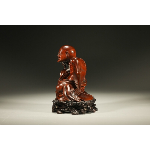 20102 - A Chinese wood figure, 18th Pr. Size:(Height16cm, Width10.5cm, Length11cm) Condition:(Good Condition... 