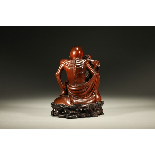 20102 - A Chinese wood figure, 18th Pr. Size:(Height16cm, Width10.5cm, Length11cm) Condition:(Good Condition... 