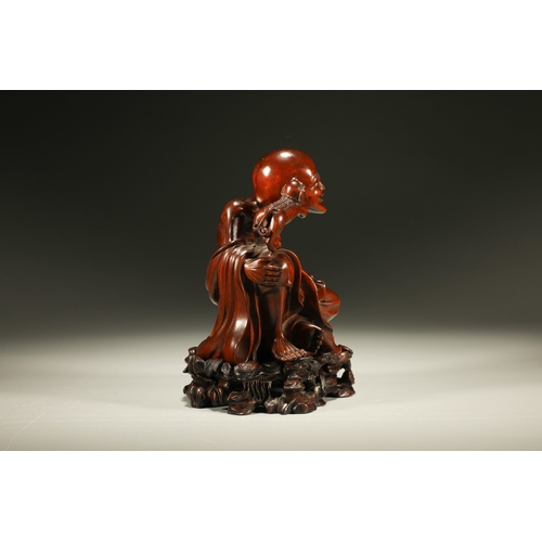 20102 - A Chinese wood figure, 18th Pr. Size:(Height16cm, Width10.5cm, Length11cm) Condition:(Good Condition... 