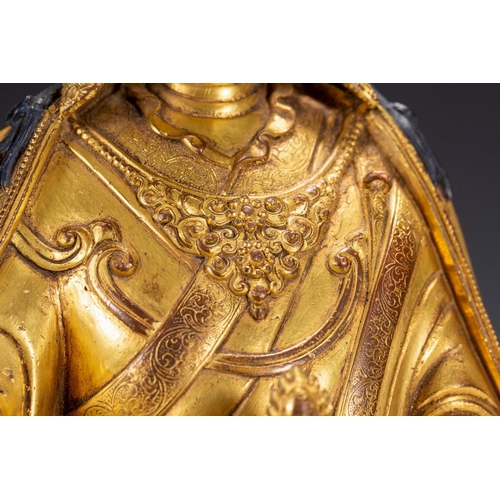 20128 - A Chinese gilt bronze buddaha, 17th Pr. Size:(Height24cm, Width13.5cm, Length16.5cm, Weight2800g) Co... 