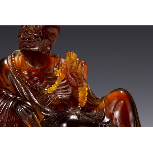 20129 - A Chinese amber made buddaha, 18th Pr. Size:(Height10cm, Width5.5cm, Length12cm, Weight190g) Conditi... 