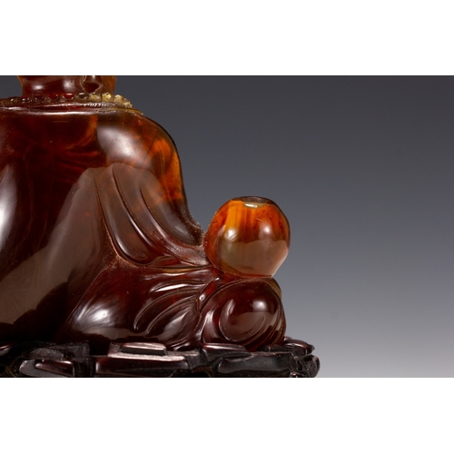 20129 - A Chinese amber made buddaha, 18th Pr. Size:(Height10cm, Width5.5cm, Length12cm, Weight190g) Conditi... 