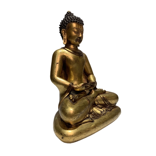 20231 - A Chinese bronze made gilt Buddaha, 16/17th Century Pr. Size:(Height23cm, Width17cm, Depth11cm) Cond... 