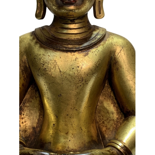 20231 - A Chinese bronze made gilt Buddaha, 16/17th Century Pr. Size:(Height23cm, Width17cm, Depth11cm) Cond... 