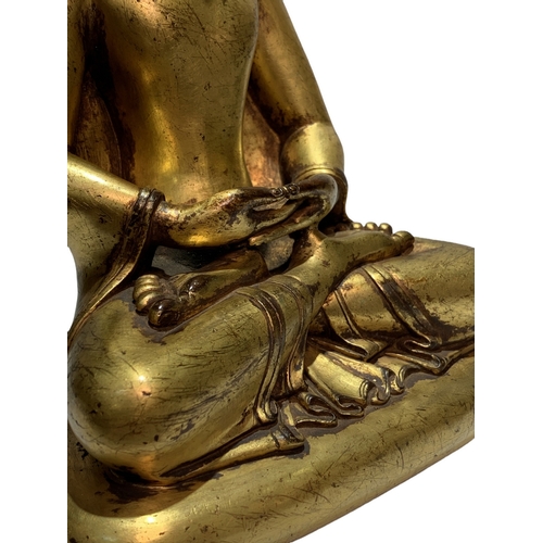 20231 - A Chinese bronze made gilt Buddaha, 16/17th Century Pr. Size:(Height23cm, Width17cm, Depth11cm) Cond... 