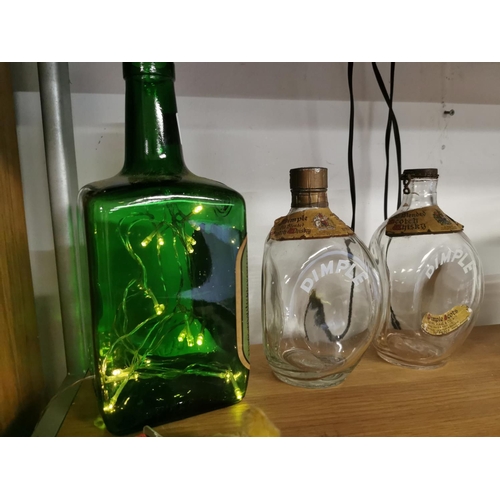 104 - Two Vintage Vintage Dimple Haig And A Squires London Gin Bottle With Lights In It